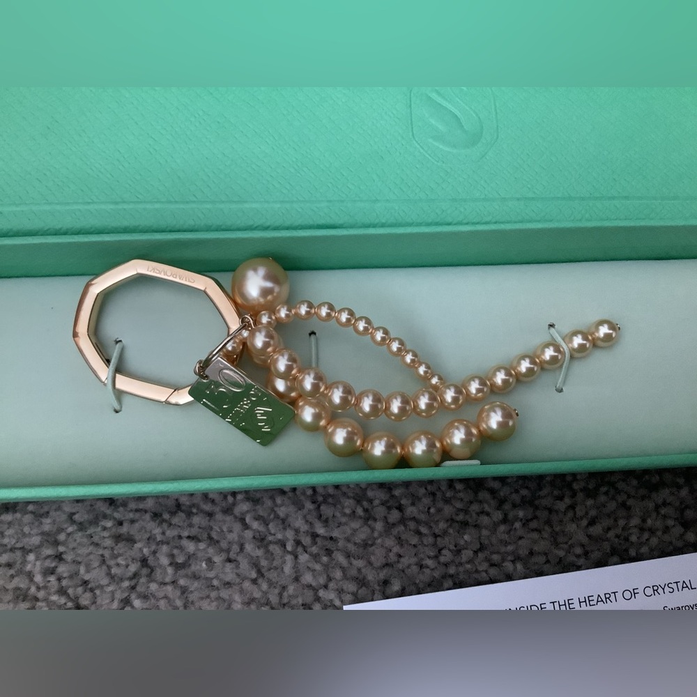 Swarovski Gold Pearl Bag Charm in Crystal Gold.  NWT